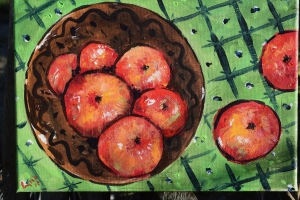 Apples in a brown dish